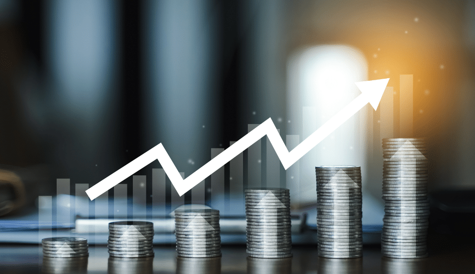 Stack of coins on a table. money earning profit business concept.