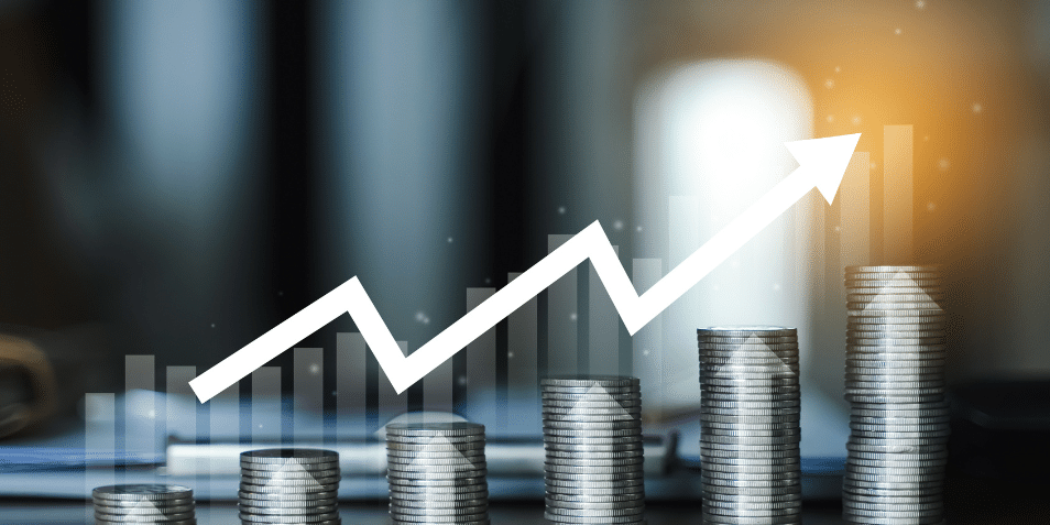 Stack of coins on a table. money earning profit business concept.