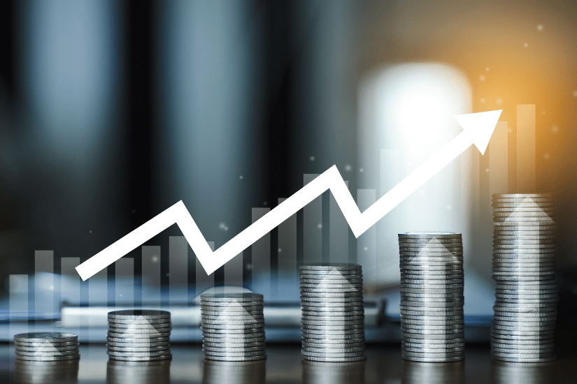 Stack of coins on a table. money earning profit business concept.